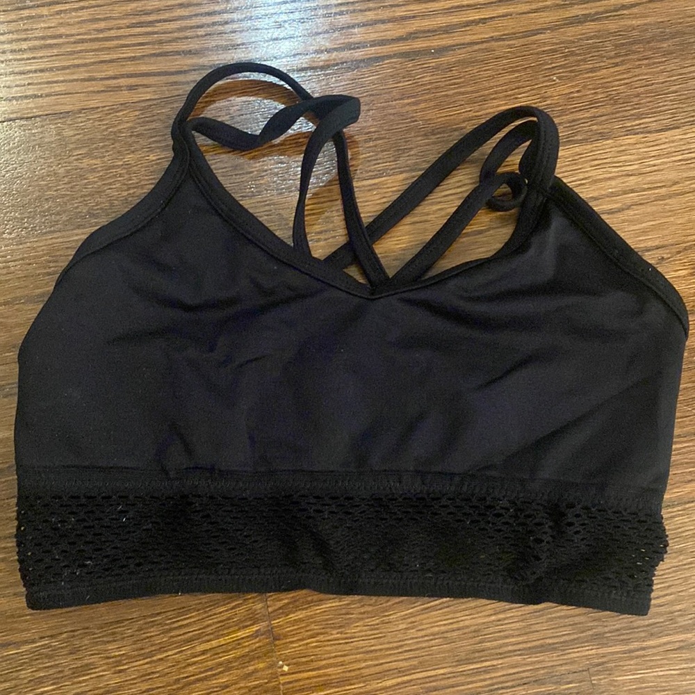 Forever 21 black sports bra with mesh on bottom